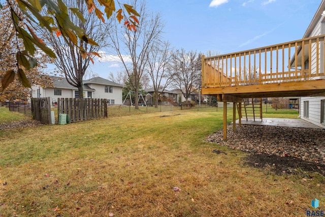 view of yard featuring a patio area and a deck