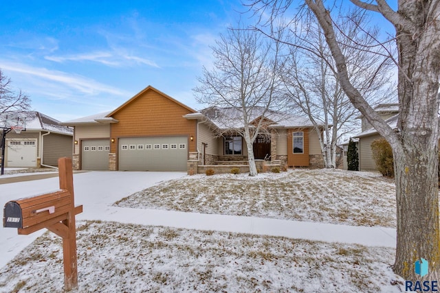 ranch-style home featuring a garage