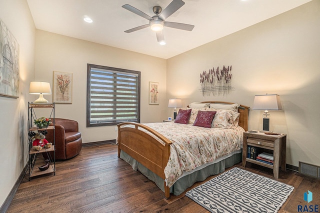 bedroom with ceiling fan and dark hardwood / wood-style floors