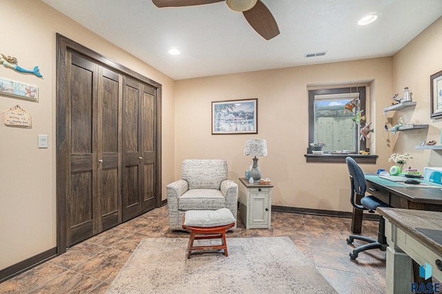 office space with ceiling fan