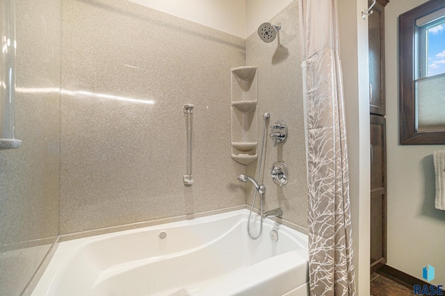 bathroom featuring shower / bath combination with curtain