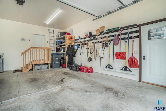 garage featuring a garage door opener