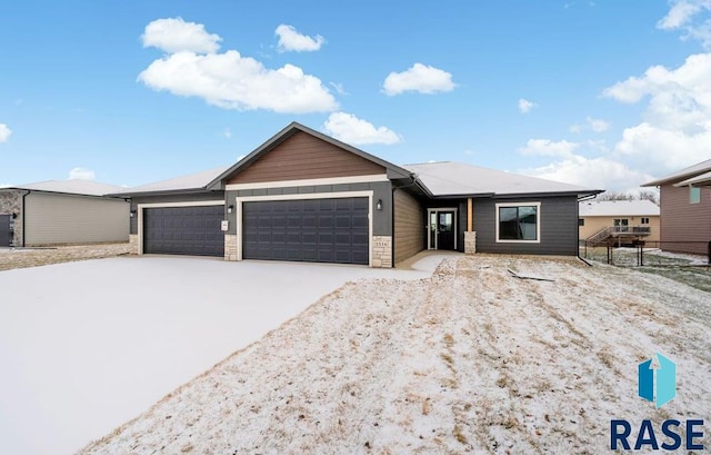 single story home featuring a garage