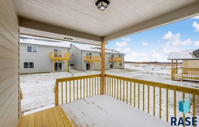 view of snow covered deck