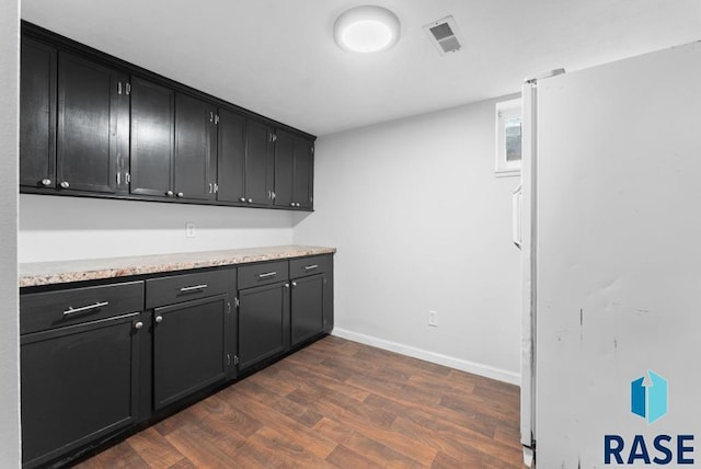 interior space with dark wood-type flooring