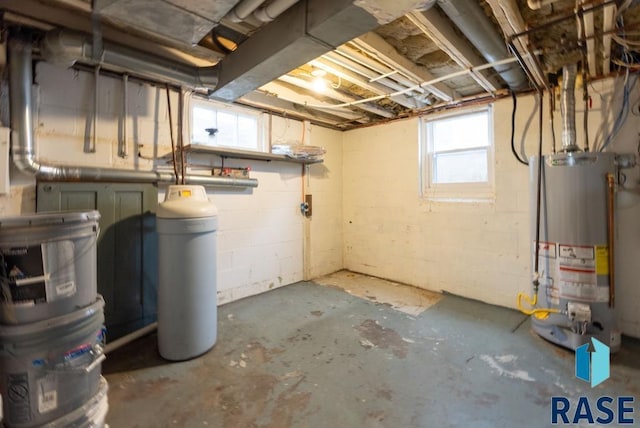 basement featuring gas water heater