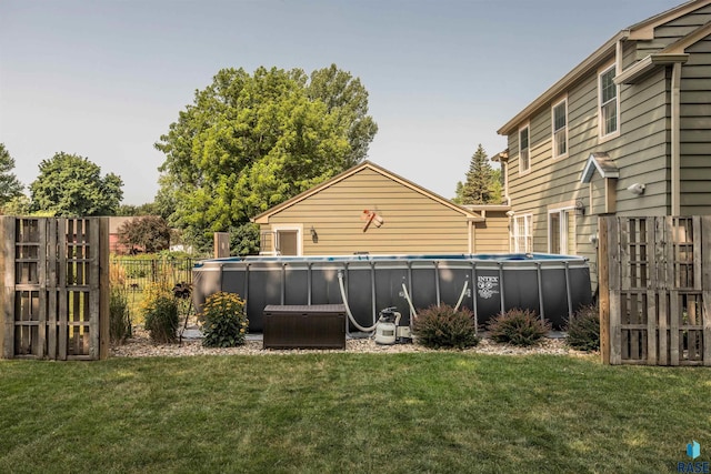 view of yard featuring a fenced in pool