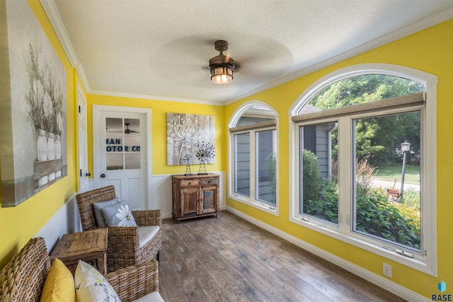 sunroom / solarium with ceiling fan