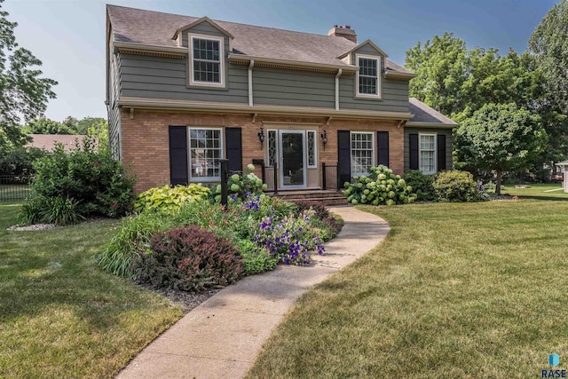 view of front facade featuring a front yard