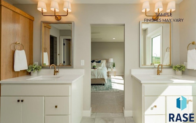 bathroom with tile patterned flooring and vanity