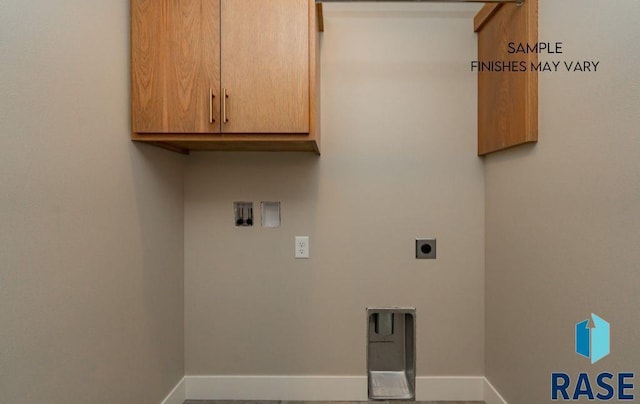 clothes washing area with hookup for an electric dryer, cabinets, and hookup for a washing machine