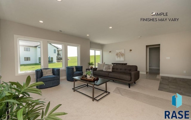 carpeted living room featuring a wealth of natural light