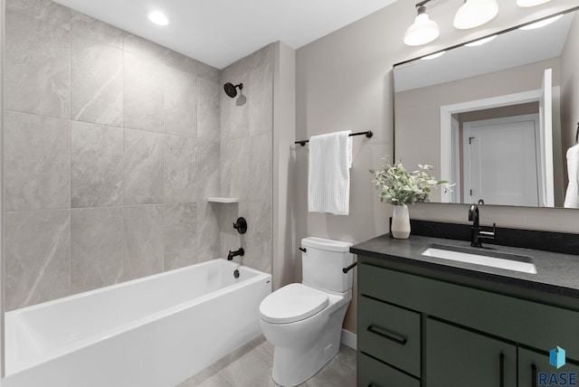 full bath with shower / tub combination, tile patterned flooring, vanity, and toilet