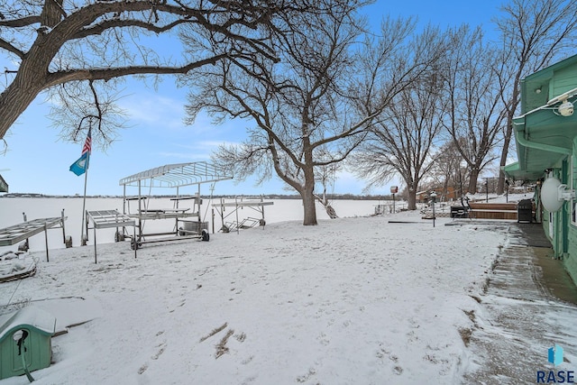 view of yard covered in snow