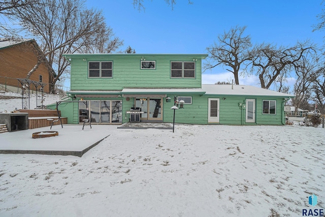 view of snow covered property