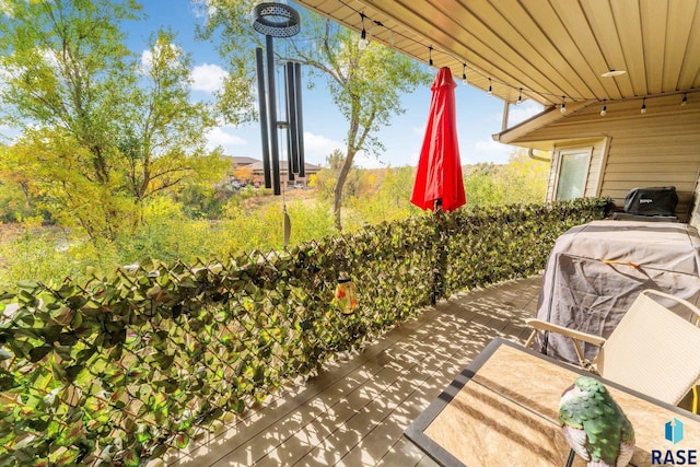 view of patio / terrace with a grill and a deck