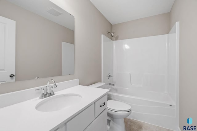 full bathroom with tile patterned floors, vanity, toilet, and bathtub / shower combination