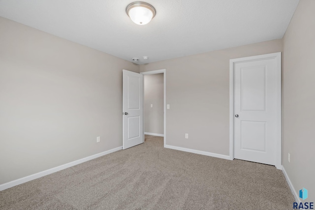 unfurnished bedroom featuring carpet floors