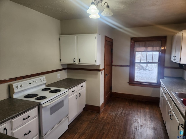 kitchen with white electric range, sink, dark hardwood / wood-style floors, a textured ceiling, and white cabinetry