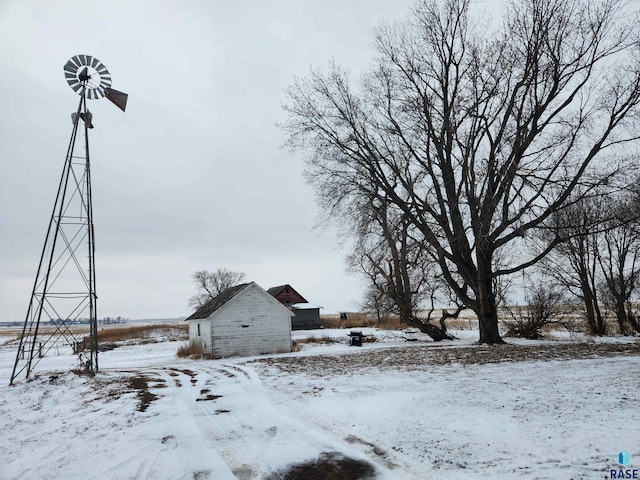 view of yard layered in snow