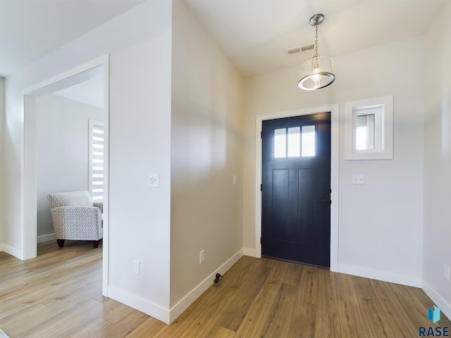 foyer with light hardwood / wood-style flooring