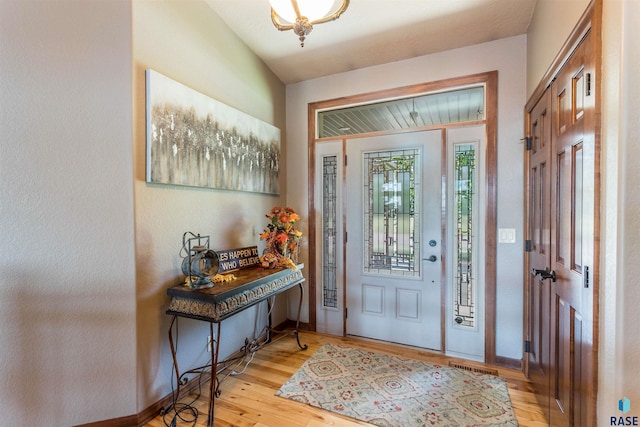 entrance foyer featuring light wood-type flooring