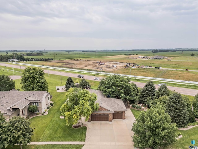 birds eye view of property featuring a rural view