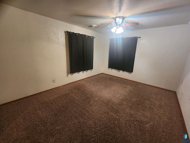 unfurnished room featuring carpet and ceiling fan