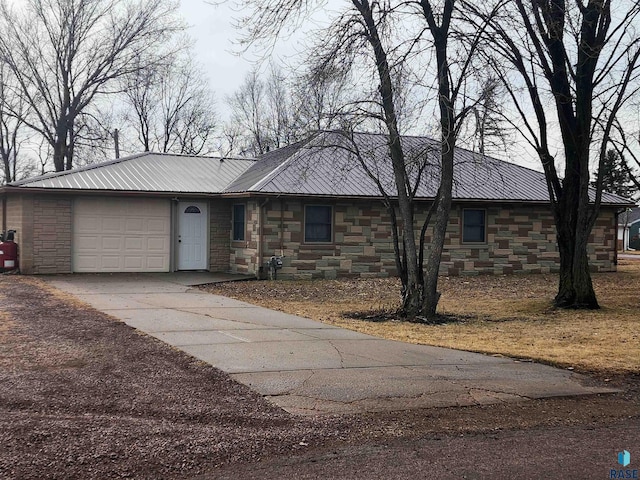 ranch-style home with a garage