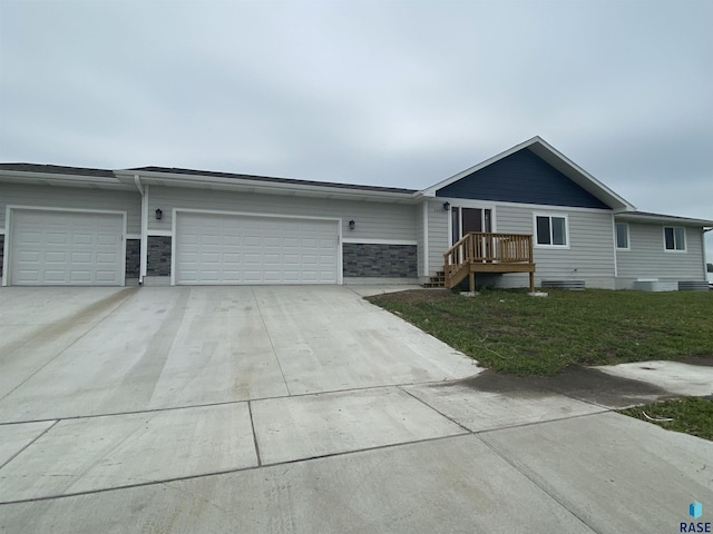 ranch-style home with a garage