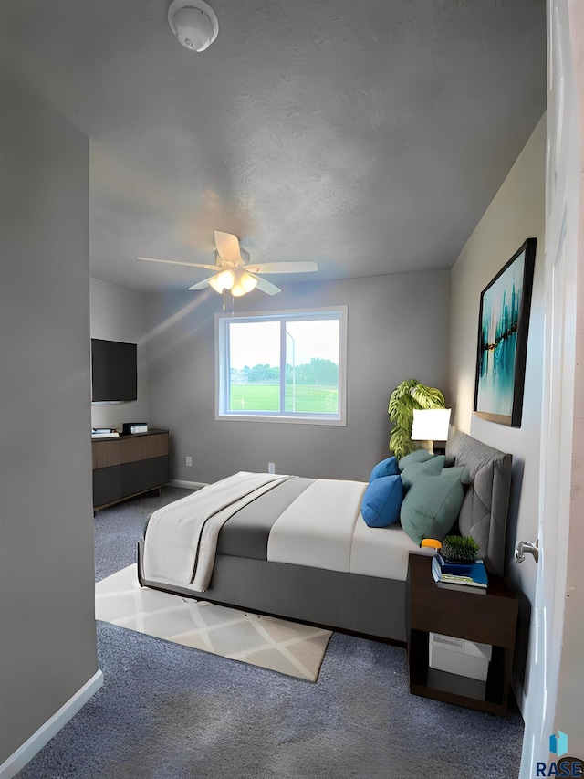 bedroom with carpet flooring and ceiling fan