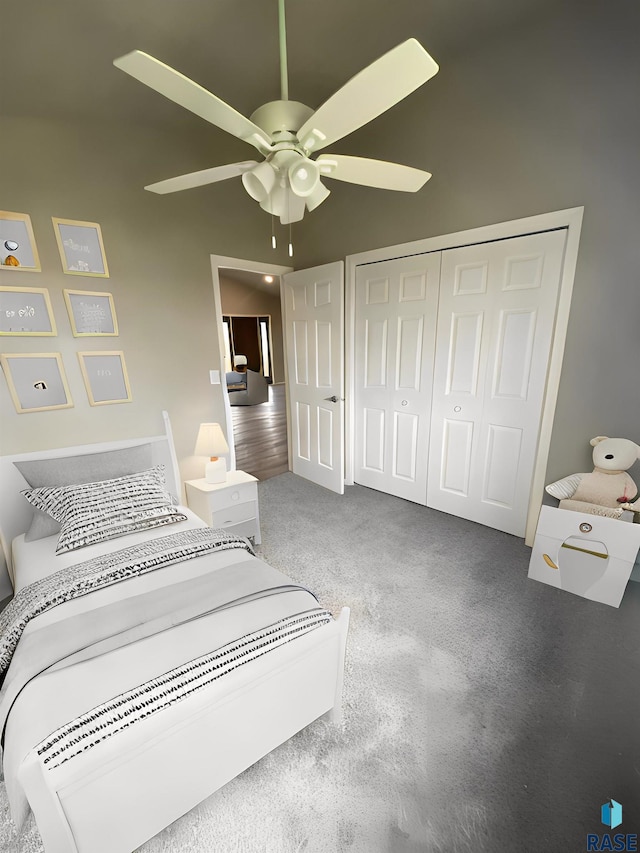 carpeted bedroom featuring a closet and ceiling fan