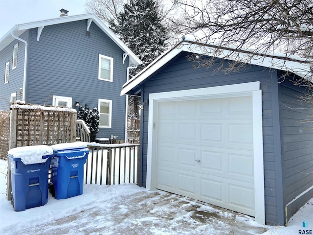 view of snow covered garage