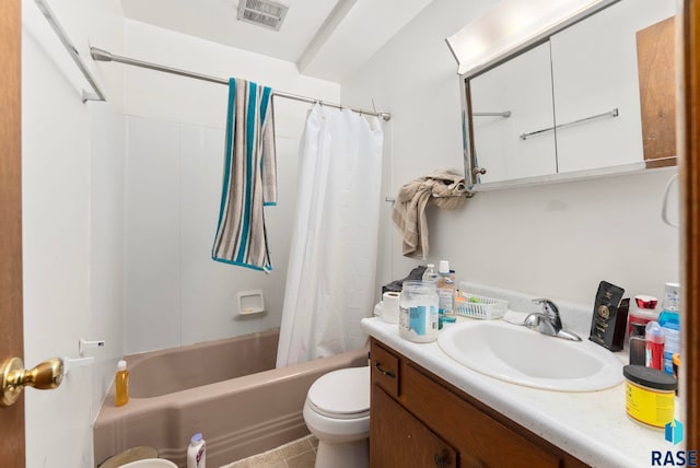 full bathroom featuring tile patterned flooring, vanity, shower / bath combo, and toilet