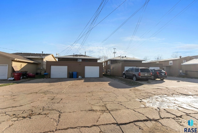 view of front of home with an outbuilding and a garage