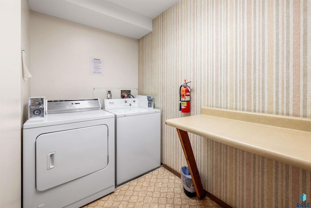 laundry room with washer and dryer