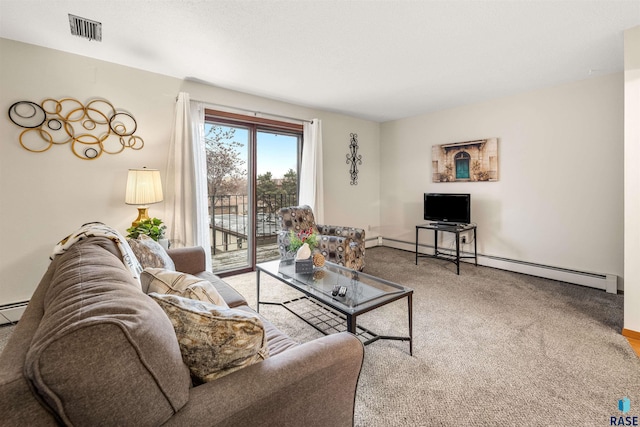 carpeted living room featuring a baseboard heating unit