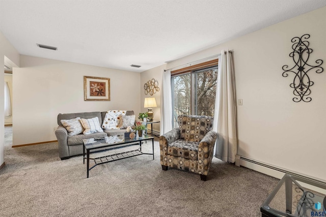 carpeted living room featuring baseboard heating