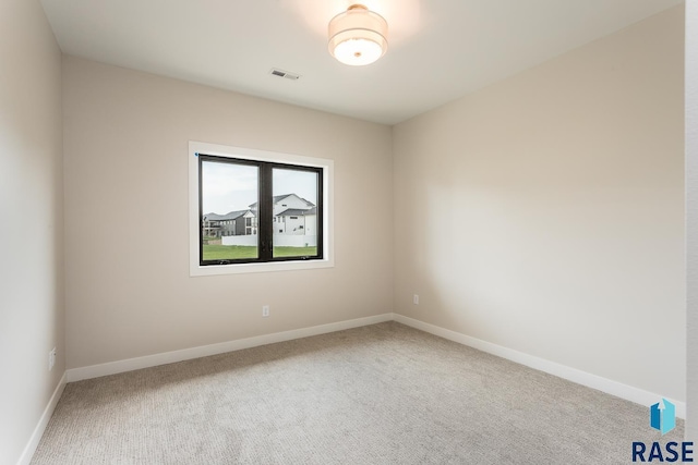 unfurnished room with carpet flooring