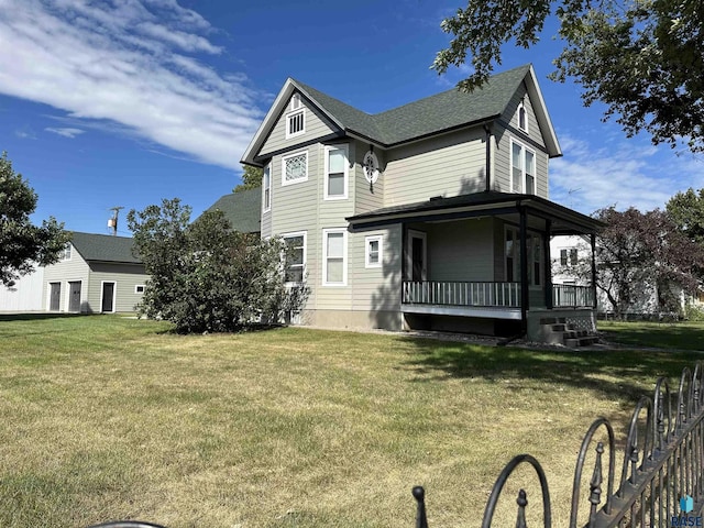 exterior space with a front lawn and covered porch