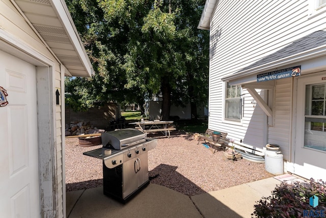 view of patio with a grill