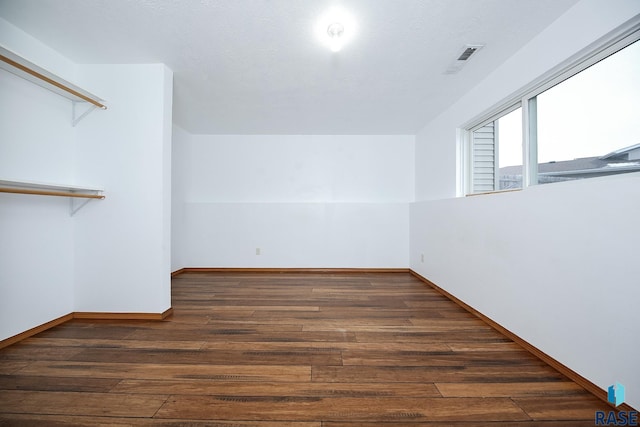 interior space featuring dark wood-type flooring