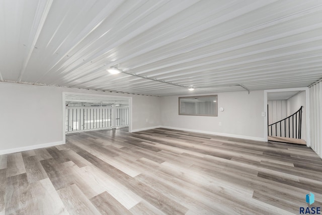 basement featuring light hardwood / wood-style floors