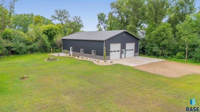 garage featuring a yard