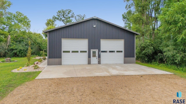 garage with a lawn