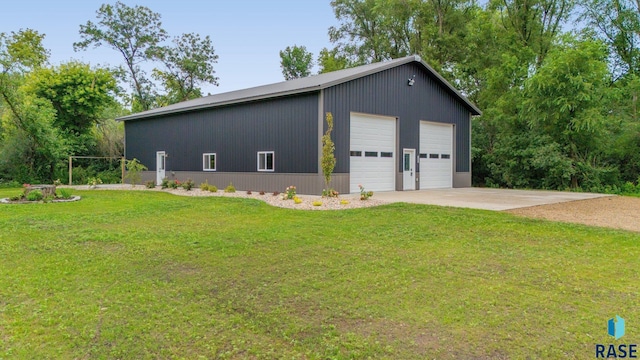 garage featuring a yard