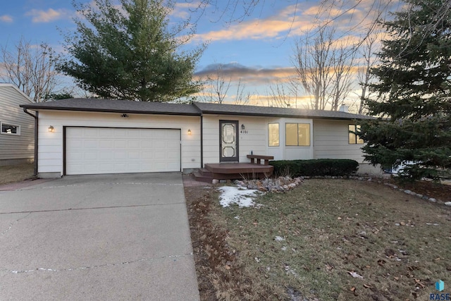 single story home featuring a garage