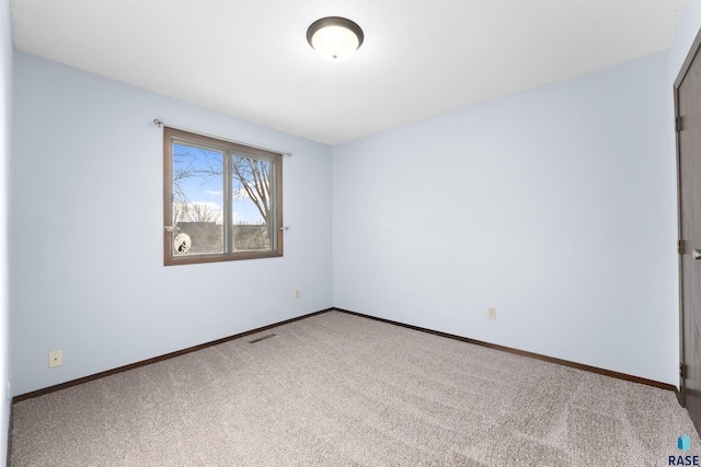 unfurnished room with carpet floors