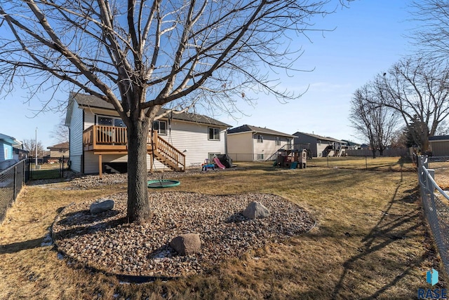 view of side of home with a wooden deck