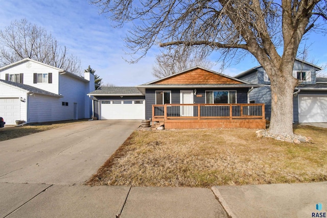 view of front facade with a garage and covered porch